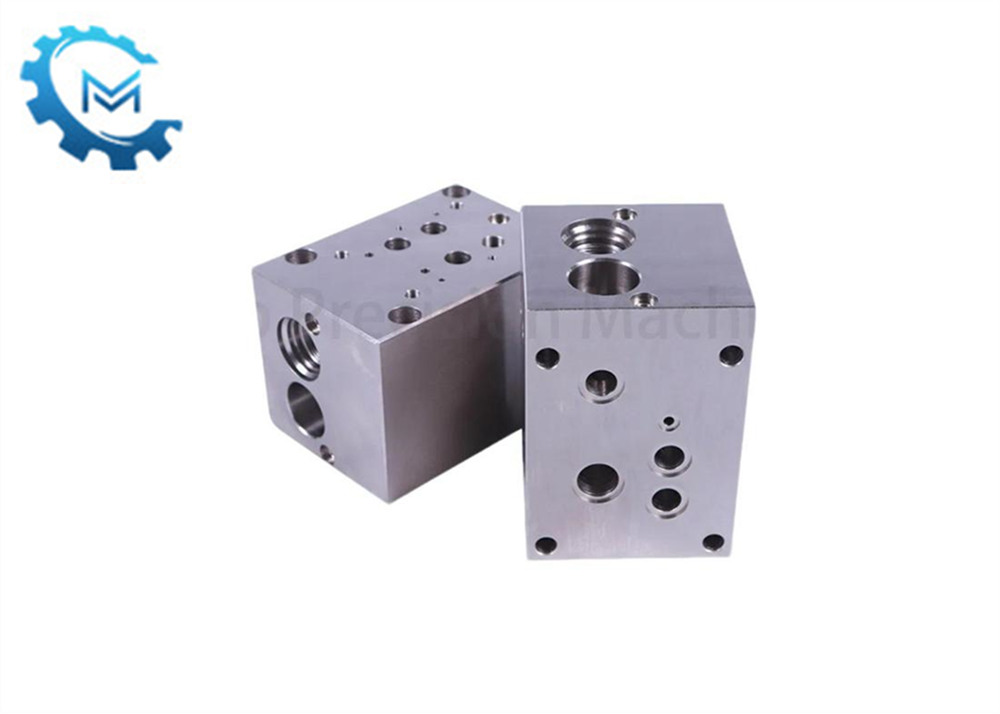Vilka är funktionerna för varje port i det hydrauliska ventilblocket?